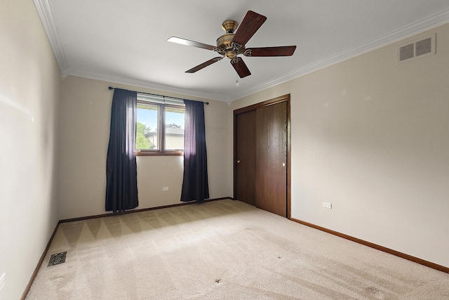 8144 Bunker Dr, Orland Park, IL 60462 - unfurnished bedroom with light carpet, ornamental molding, a closet, baseboards, and ceiling fan
