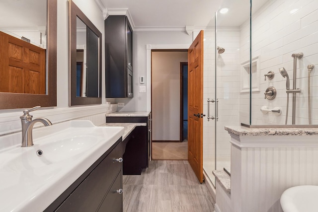 8144 Bunker Dr, Orland Park, IL 60462 - full bathroom with a stall shower, vanity, and crown molding