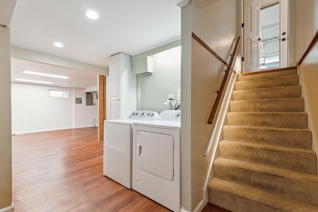 8144 Bunker Dr, Orland Park, IL 60462 - washroom featuring light wood-style floors, washing machine and clothes dryer, baseboards, and recessed lighting