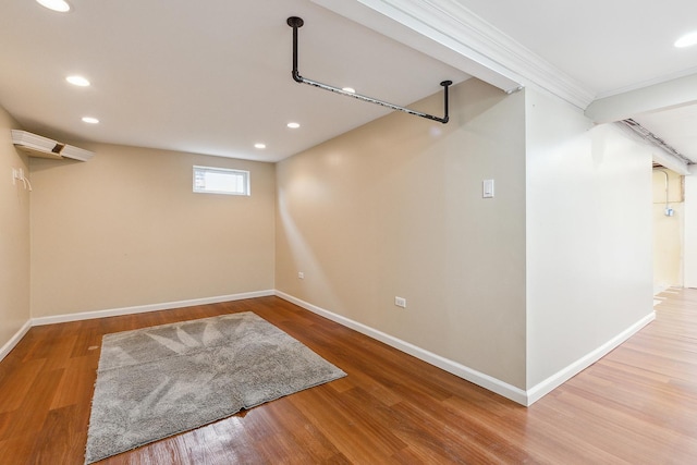 8144 Bunker Dr, Orland Park, IL 60462 - basement featuring baseboards, wood finished floors, recessed lighting, and crown molding