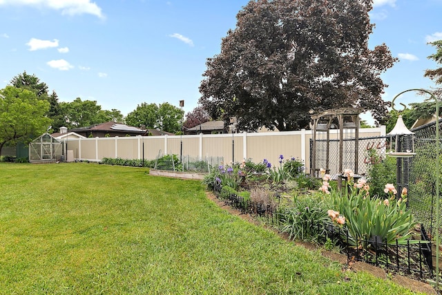 8144 Bunker Dr, Orland Park, IL 60462 - view of yard featuring a garden and an exterior structure