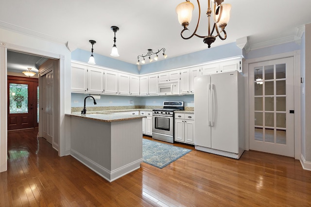 8144 Bunker Dr, Orland Park, IL 60462 - kitchen with white appliances, a sink, wood-type flooring, a peninsula, and white cabinets