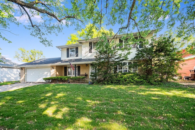 4717 176th St, Country Club Hills, IL 60478 - traditional home featuring a garage, brick siding, a front lawn, and concrete driveway