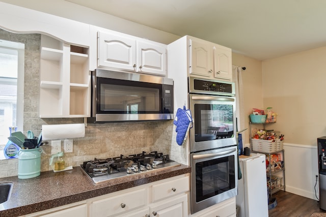 1502 S Mill St, Pontiac, IL 61764 - kitchen featuring stainless steel appliances, dark countertops, white cabinetry, and open shelves