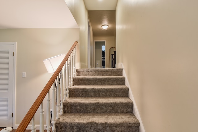 1502 S Mill St, Pontiac, IL 61764 - staircase featuring baseboards