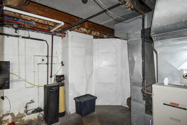 1502 S Mill St, Pontiac, IL 61764 - unfinished below grade area with a water softener and heating unit