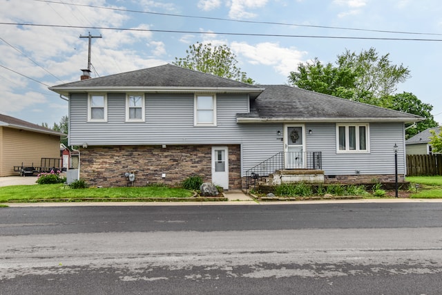 1502 S Mill St, Pontiac, IL 61764 - tri-level home with roof with shingles and stone siding