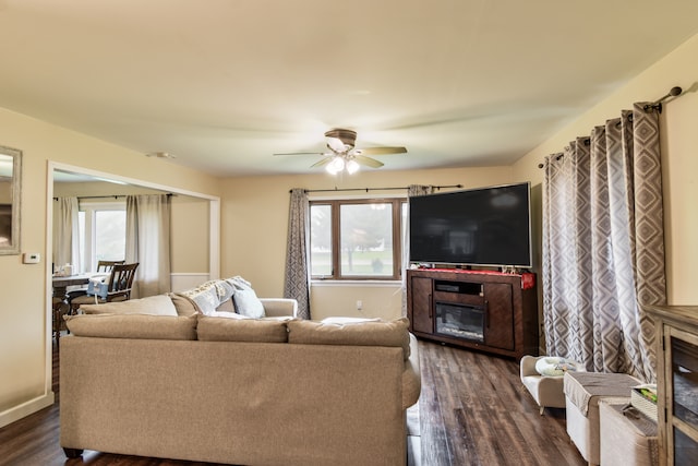 1502 S Mill St, Pontiac, IL 61764 - living area with a glass covered fireplace, plenty of natural light, and dark wood-type flooring