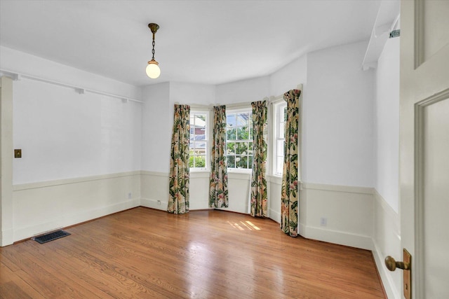 402 S Coler Ave, Urbana, IL 61801 - unfurnished room with wood finished floors