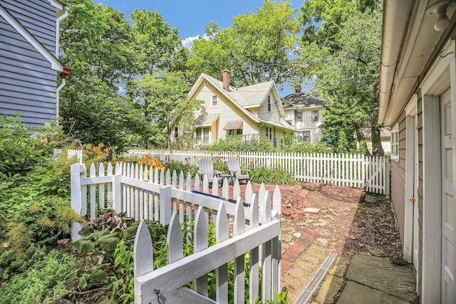 402 S Coler Ave, Urbana, IL 61801 - fenced backyard with a patio area
