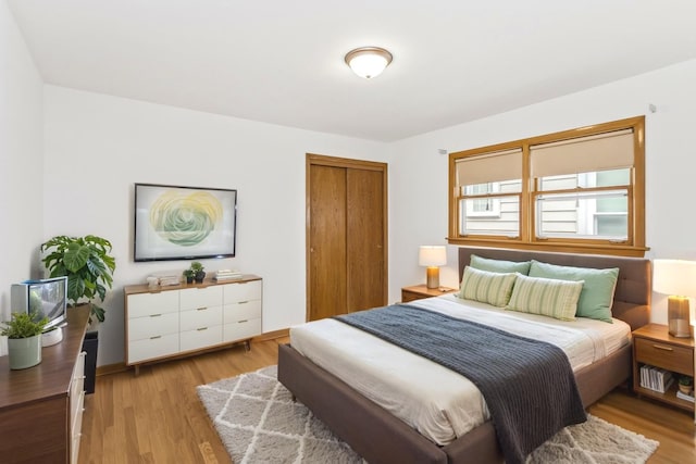 5923 W Giddings St, Chicago, IL 60630 - bedroom with light wood-type flooring and a closet