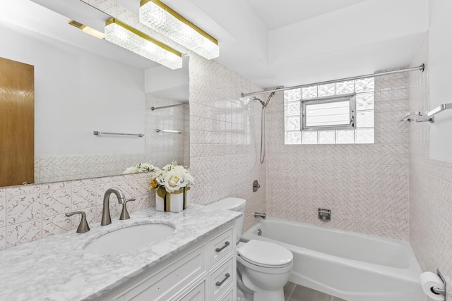 5923 W Giddings St, Chicago, IL 60630 - bathroom with tile walls, bathtub / shower combination, vanity, and toilet