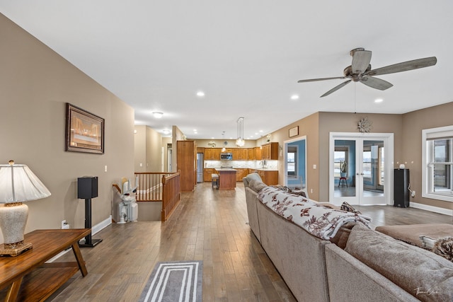 1096 Windfield Dr, Manteno, IL 60950 - living area featuring wood-type flooring, recessed lighting, baseboards, and ceiling fan