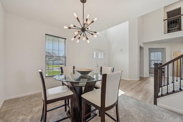 1486 Keller St, Elburn, IL 60119 - dining room featuring a chandelier, stairway, and baseboards