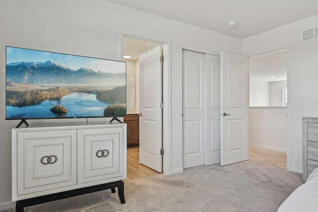 1486 Keller St, Elburn, IL 60119 - bedroom with light carpet, a closet, and baseboards