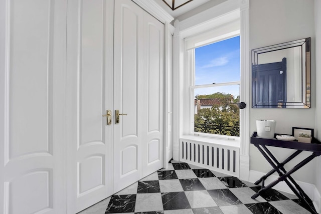 1814 N Lincoln Park W Unit 3, Chicago, IL 60614 - entrance foyer with radiator heating unit