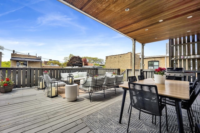 1814 N Lincoln Park W Unit 3, Chicago, IL 60614 - wooden deck featuring a grill, an outdoor hangout area, and outdoor dining space