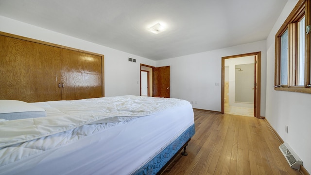 4012 Lisa Dr, Rockford, IL 61114 - bedroom featuring hardwood / wood-style flooring and baseboards
