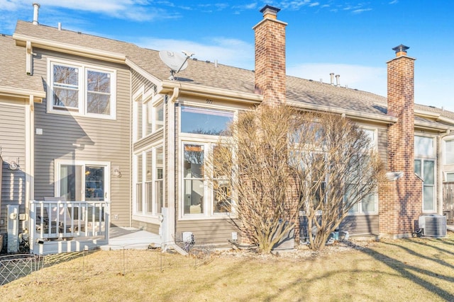 971 Heathrow Ln, Naperville, IL 60540 - rear view of house with a yard, a chimney, cooling unit, and roof with shingles