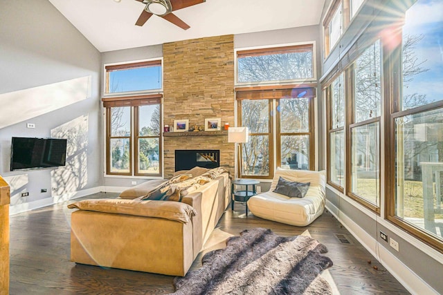 971 Heathrow Ln, Naperville, IL 60540 - living room with plenty of natural light, ceiling fan, baseboards, and high vaulted ceiling