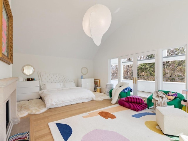 732 Bronson Ln, Highland Park, IL 60035 - bedroom featuring lofted ceiling and wood finished floors