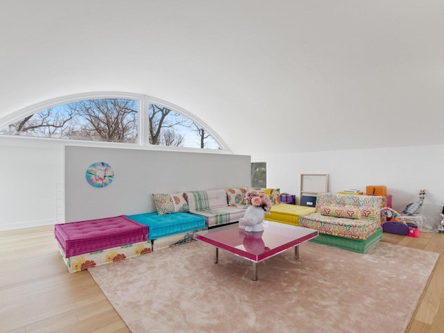 732 Bronson Ln, Highland Park, IL 60035 - living room featuring wood finished floors, healthy amount of natural light, and vaulted ceiling