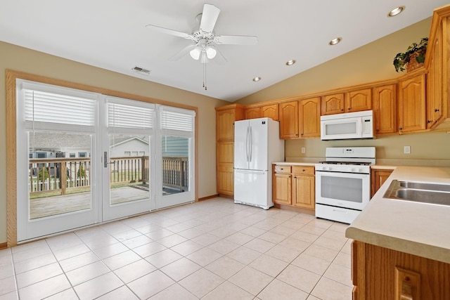1622 Evergreen Ave, Crown Point, IN 46307 - kitchen with white appliances, light countertops, lofted ceiling, recessed lighting, and a ceiling fan