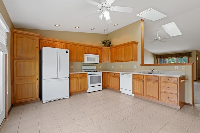 1622 Evergreen Ave, Crown Point, IN 46307 - kitchen featuring white appliances, a skylight, a sink, ceiling fan, and a peninsula