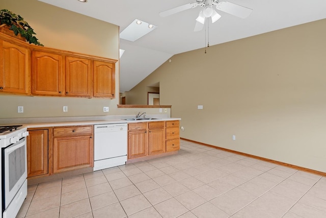 1622 Evergreen Ave, Crown Point, IN 46307 - kitchen featuring white appliances, a sink, vaulted ceiling, ceiling fan, and light countertops