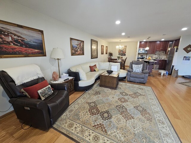 3110 Pheasant Creek Dr Unit 304, Northbrook, IL 60062 - living area with light wood-style floors, recessed lighting, and a chandelier