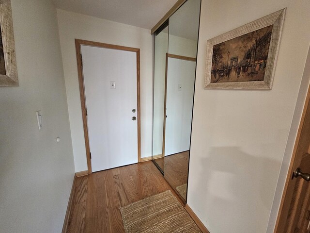 3110 Pheasant Creek Dr Unit 304, Northbrook, IL 60062 - hall featuring wood finished floors and baseboards