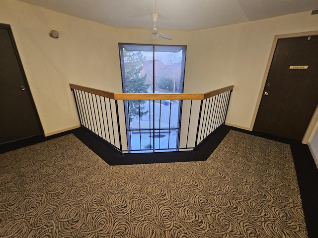 3110 Pheasant Creek Dr Unit 304, Northbrook, IL 60062 - corridor featuring baseboards and dark colored carpet
