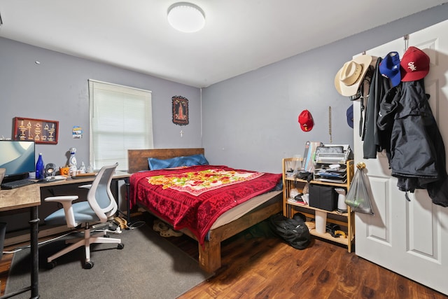 411 N Crestwood Ave, Mchenry, IL 60051 - bedroom featuring wood finished floors and an office area