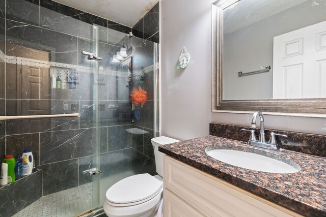 411 N Crestwood Ave, Mchenry, IL 60051 - bathroom with toilet, a shower stall, and vanity