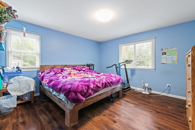 411 N Crestwood Ave, Mchenry, IL 60051 - bedroom with baseboards and wood finished floors