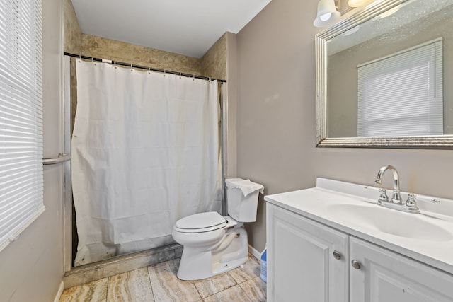 411 N Crestwood Ave, Mchenry, IL 60051 - bathroom featuring toilet, vanity, a shower with shower curtain, and baseboards