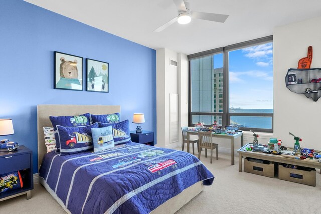 600 N Lake Shore Dr Unit 1105, Chicago, IL 60611 - carpeted bedroom with expansive windows and ceiling fan