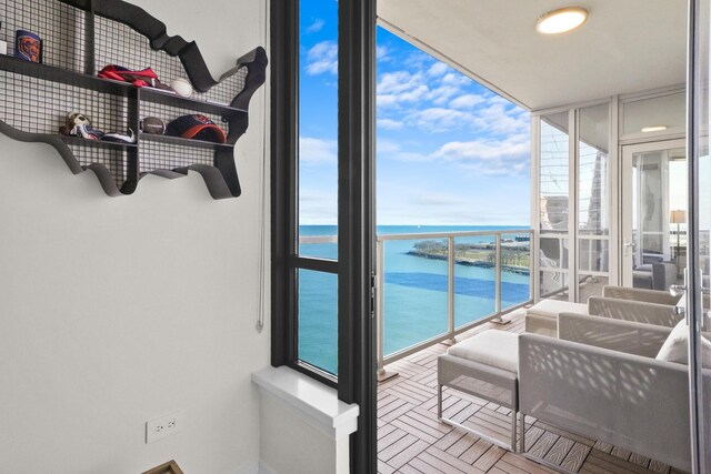 600 N Lake Shore Dr Unit 1105, Chicago, IL 60611 - balcony featuring a water view and a sunroom