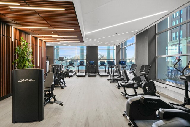 600 N Lake Shore Dr Unit 1105, Chicago, IL 60611 - workout area featuring floor to ceiling windows, healthy amount of natural light, and wood finished floors