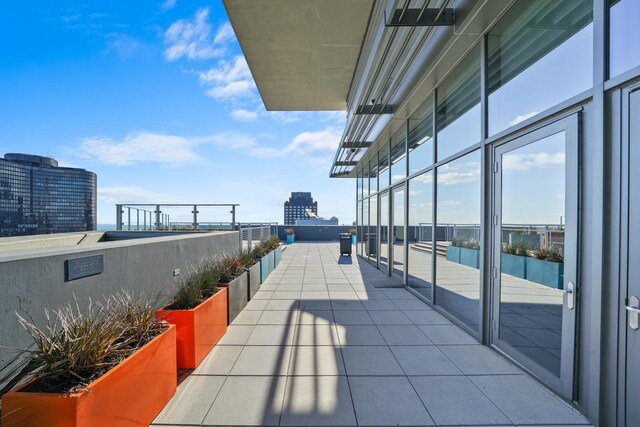600 N Lake Shore Dr Unit 1105, Chicago, IL 60611 - view of patio featuring a city view and a balcony