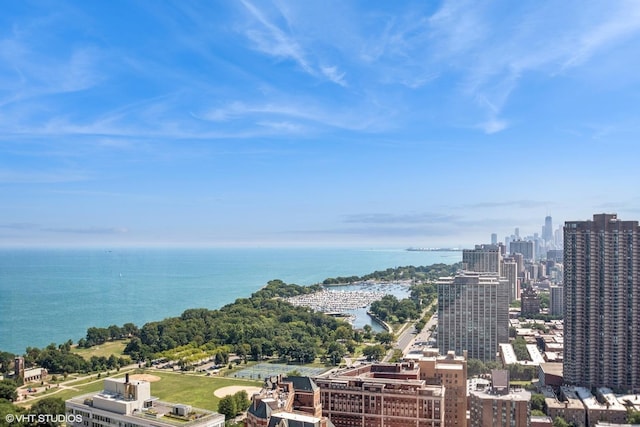 view of urban area with a large body of water