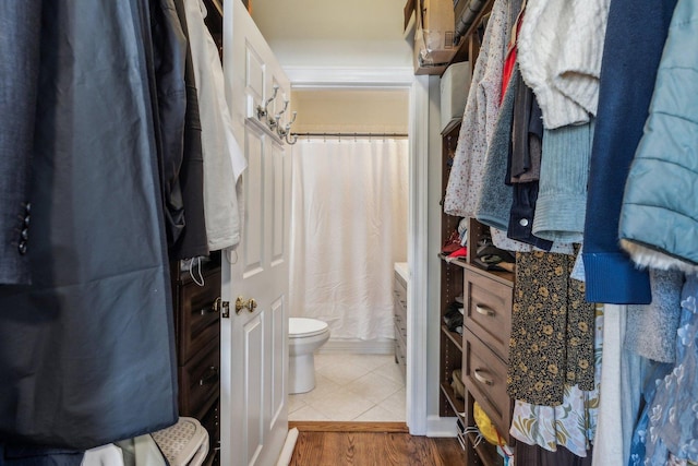 5140 N Albany Ave Unit 1, Chicago, IL 60625 - bathroom featuring toilet, vanity, curtained shower, and tile patterned floors