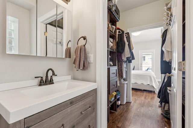 5140 N Albany Ave Unit 1, Chicago, IL 60625 - ensuite bathroom with wood finished floors and vanity