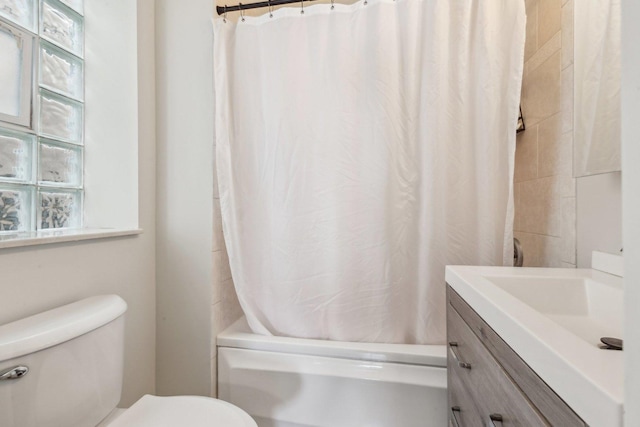 5140 N Albany Ave Unit 1, Chicago, IL 60625 - full bath featuring toilet, vanity, shower / tub combo, and plenty of natural light
