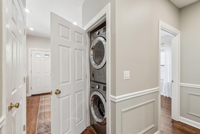 5140 N Albany Ave Unit 1, Chicago, IL 60625 - clothes washing area featuring stacked washing machine and dryer, dark wood finished floors, and recessed lighting