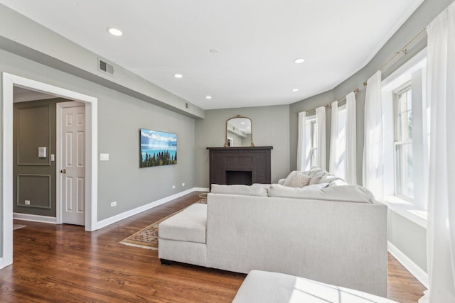 5140 N Albany Ave Unit 1, Chicago, IL 60625 - living area featuring a brick fireplace, wood finished floors, baseboards, and recessed lighting