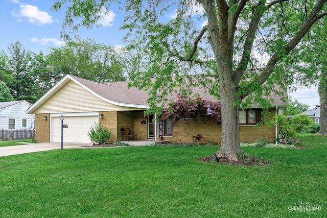 view of front of property with brick siding, concrete driveway, and a garage