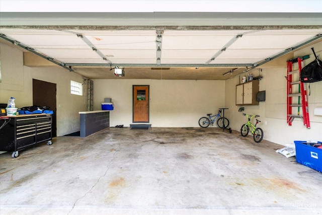 garage featuring a garage door opener