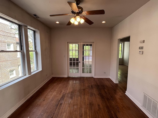 3353 W Wilson Ave Unit 3F, Chicago, IL 60625 - spare room with dark wood-style flooring, plenty of natural light, baseboards, and recessed lighting