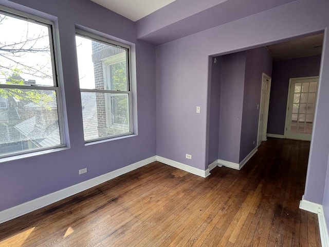 3353 W Wilson Ave Unit 3F, Chicago, IL 60625 - empty room featuring hardwood / wood-style floors and baseboards